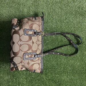 Brown Shoulder Bag with Leather Straps and Signature Pattern